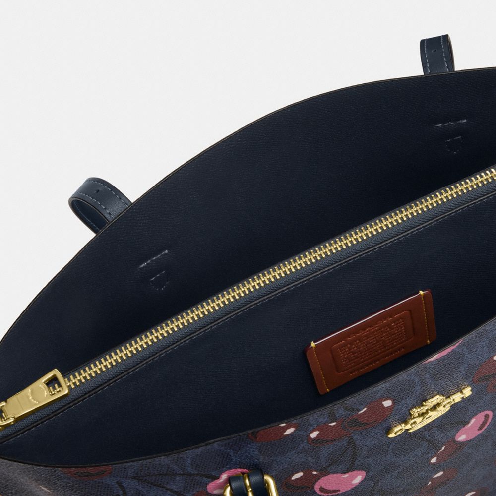 코치 Mollie Tote In Signature Canvas With Cherry Print 이미지