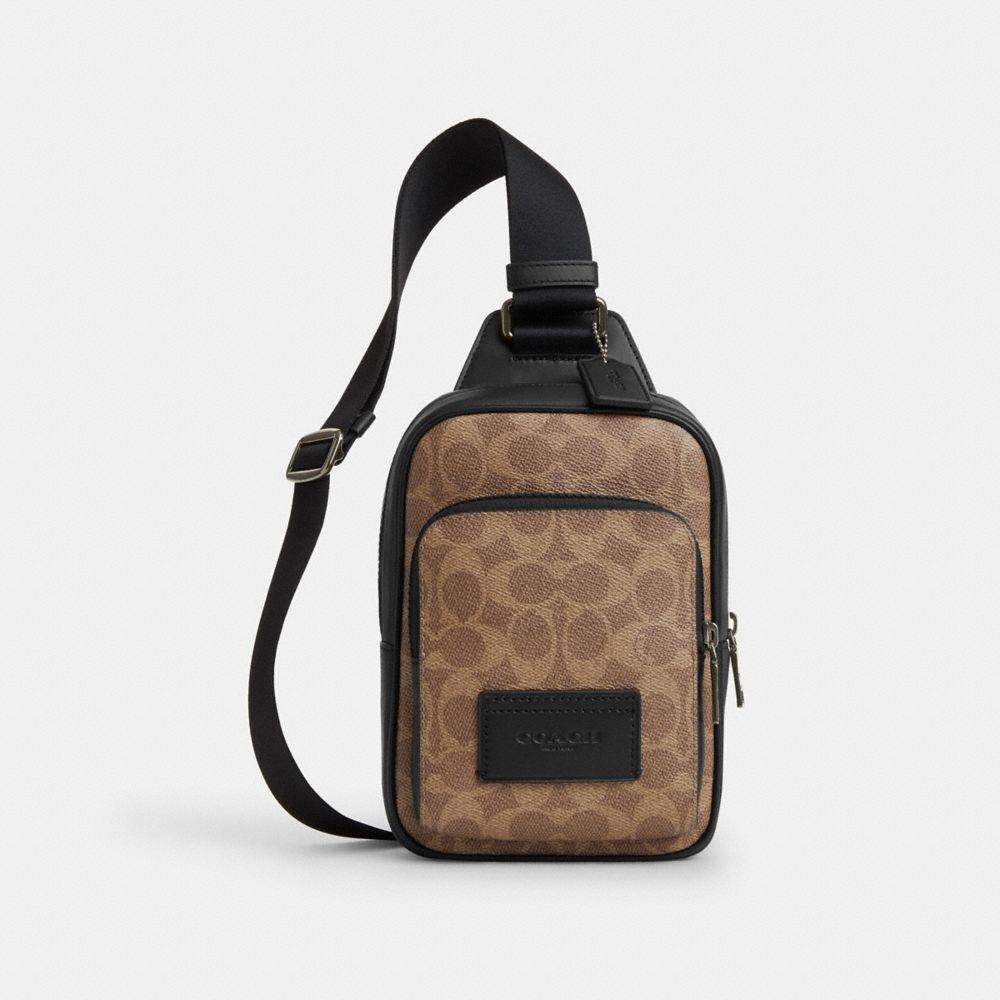 코치 Racer Sling Pack In Signature Canvas 이미지