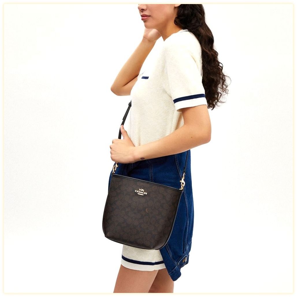 코치 City Bucket Bag In Signature Canvas 이미지