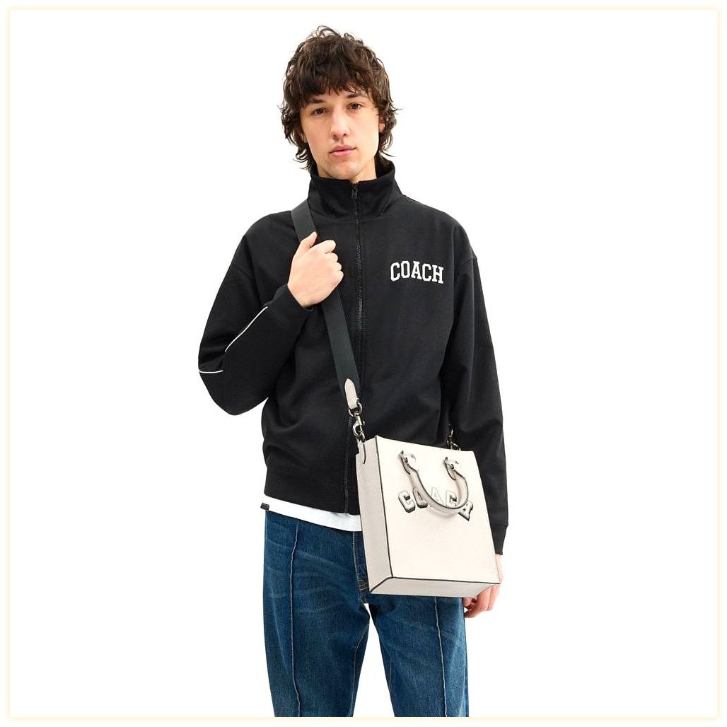 코치 Dylan Tote Bag With Varsity Motif 이미지