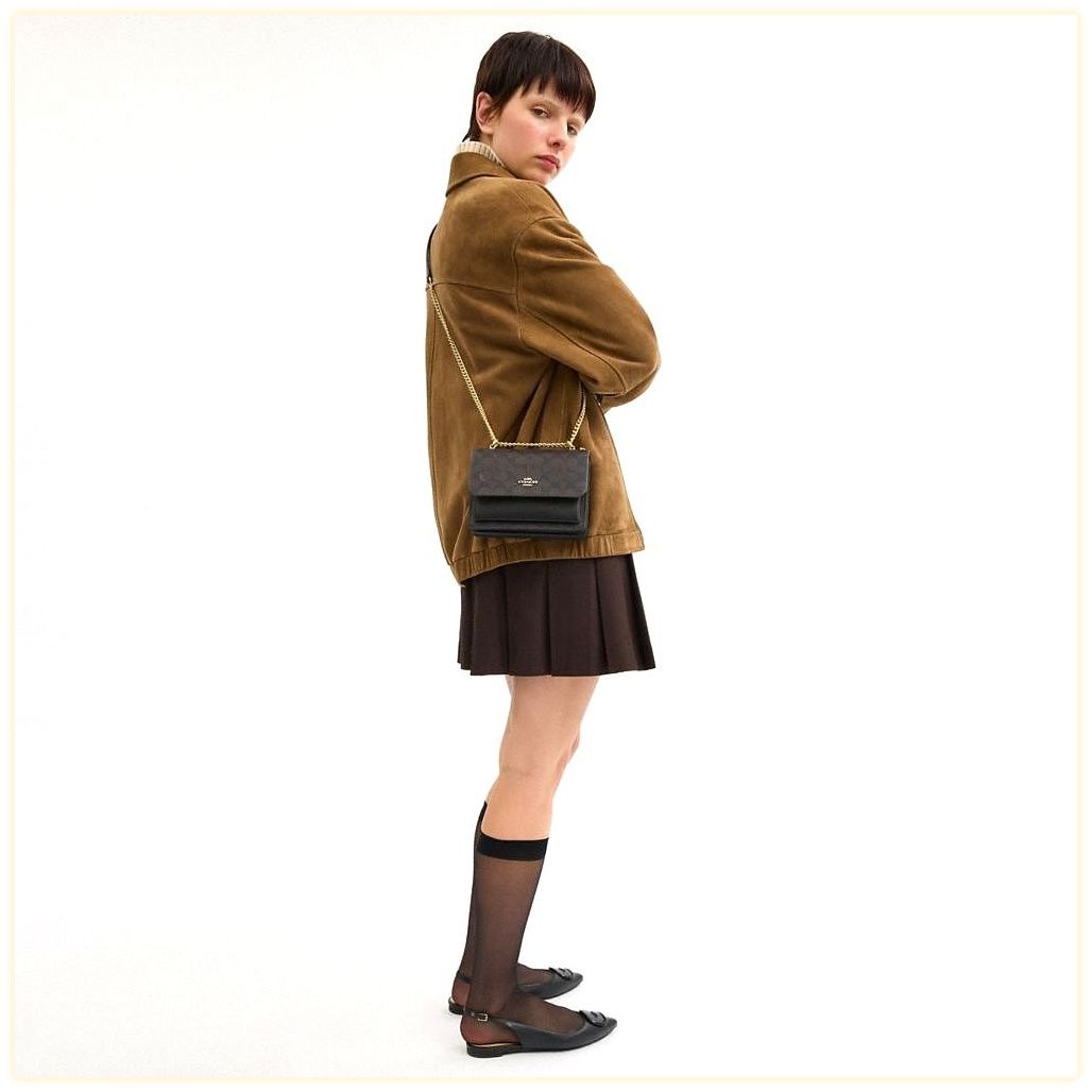 코치 Mini Klare Crossbody Bag In Signature Canvas 이미지