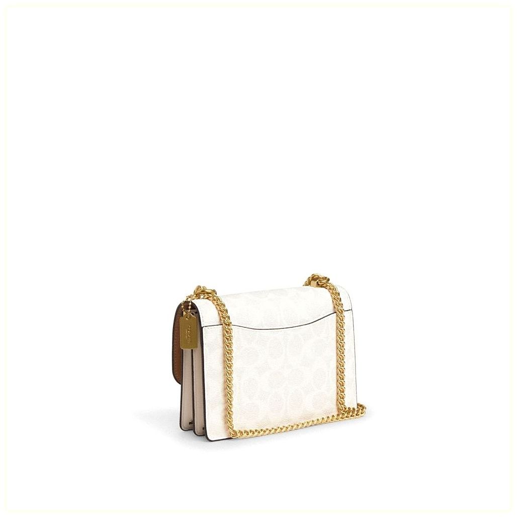 코치 Mini Klare Crossbody Bag In Signature Canvas 이미지
