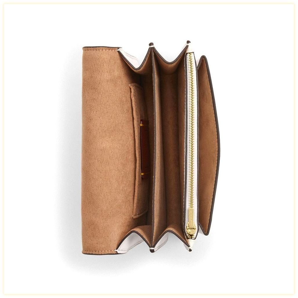 코치 Mini Klare Crossbody Bag In Signature Canvas 이미지