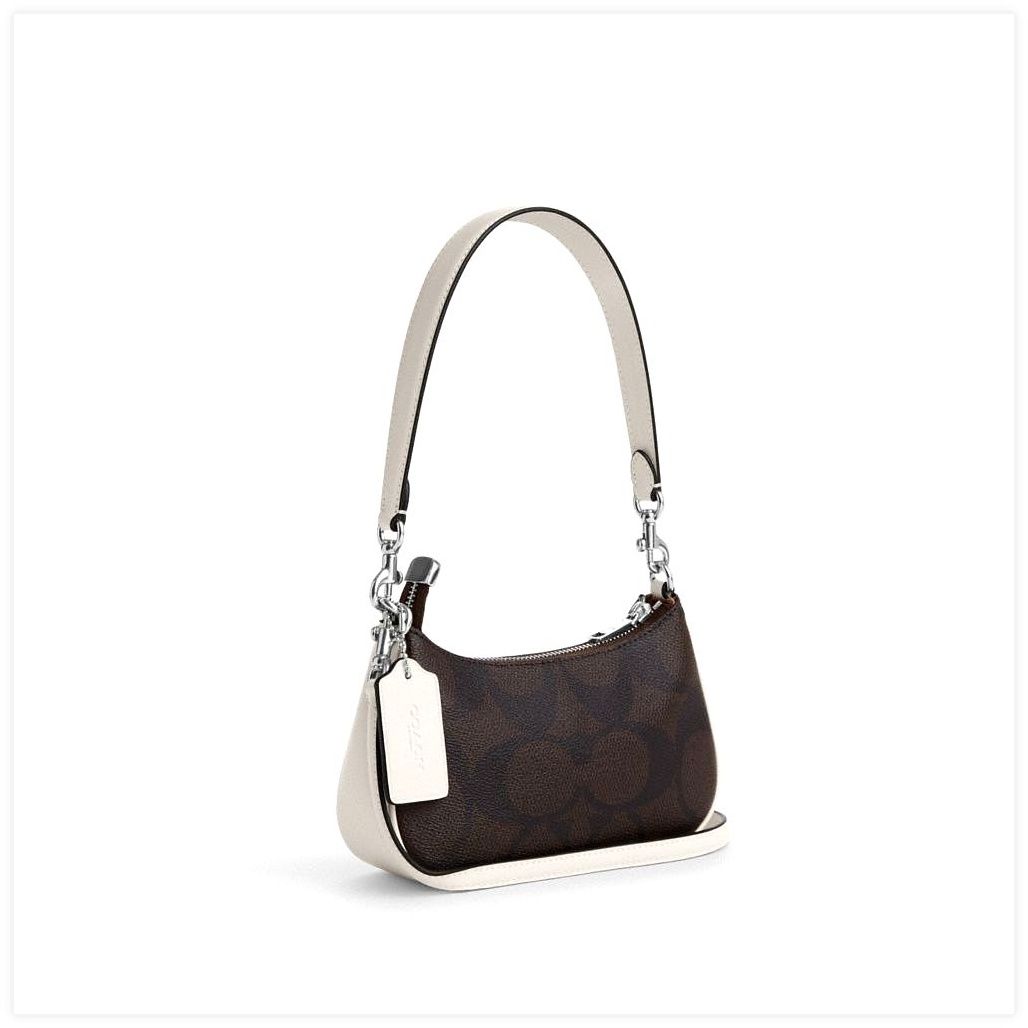 코치 Teri Mini Crossbody Bag In Signature Canvas With Coach Graphic 이미지